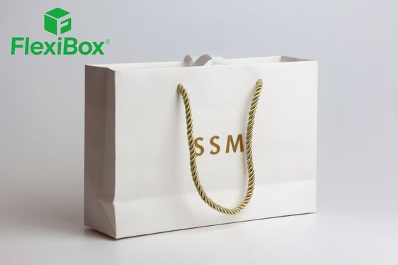 White Textured Specialty Paper Tote Bag with Gold-Foiled Lettering and Twisted Rope Handles