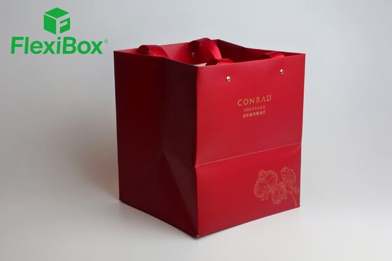 Premium Red Hotel Gift Bag with Gold Hot-Stamped Logo and Reinforced Metal Eyelets